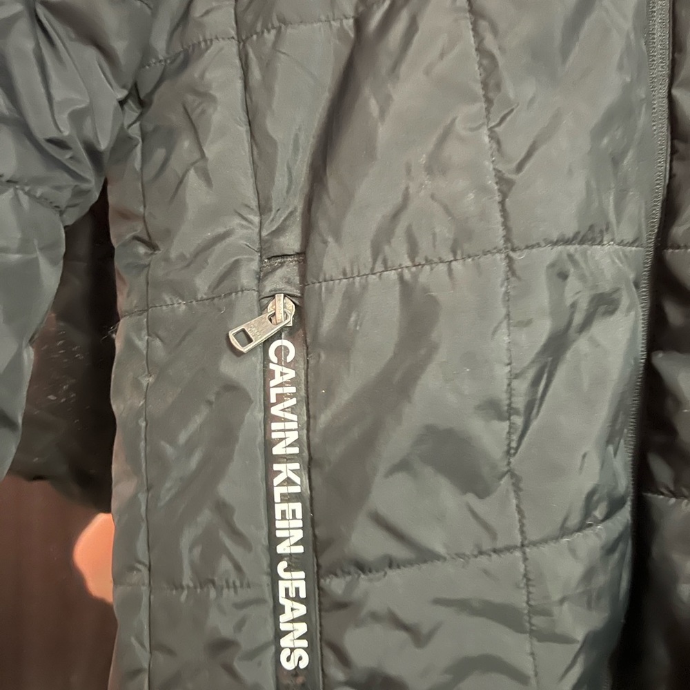 Boys black Calvin Klein winter coat. Size large (14/16).